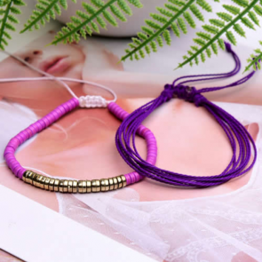 Textilarmband für Damen 2-teilig in lila und gold